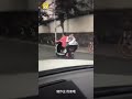 Chinese Student Caught Doing Her Homework on the Back of a Moving Motorcycle