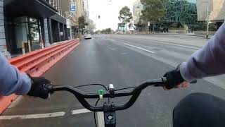 Cycling empty streets. St.Kilda Road, Flinders St.  Hosier Lane.  Melbourne. Stage 4 lock down. BMX