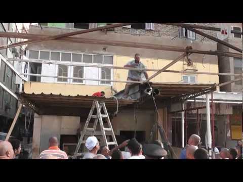 بلدوزر البلدية فى مطار امبابة