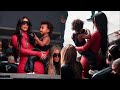 Kim Kardashian dotes on son Psalm who protects his ears with headphones as they sit front row at...