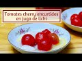 Tomates cherry encurtidos en jugo de lichi. Exquisito y delicado aperitivo chino para el verano