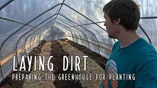 Bringing in dirt - Preparing the greenhouse for planting