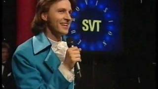 Melodifestivalen 40 år (1995) - Björn Kjellman imiterar schlagers - Del 2 chords