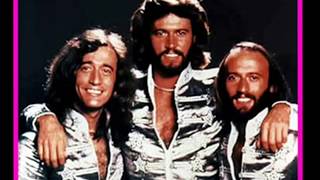 Bee Gees -  More Than A Woman [Extended Re-Edit] Resimi