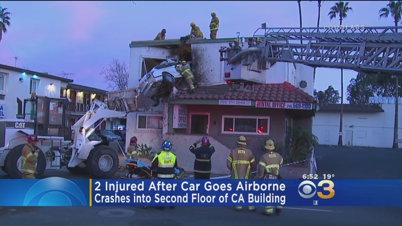 2 Injured After Car Goes Airborne, Crashes Into 2nd Floor - YouTube