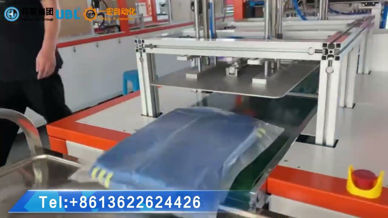 Huanlian Yihong Suit folding packaging machine, cloth folder, garment folder