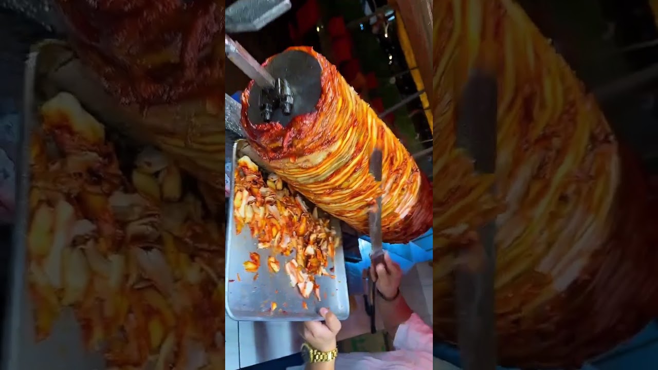 Chicken shawarma on charcoal grill 