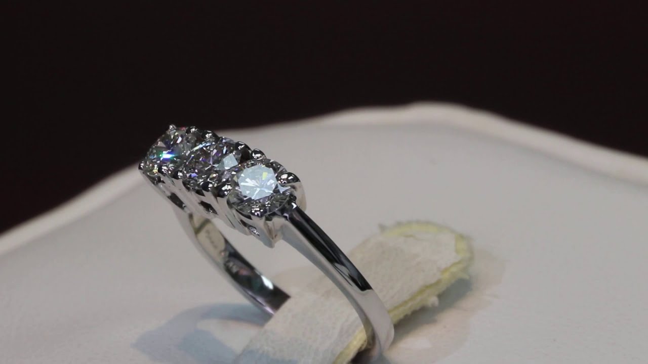 three diamond ring in white gold