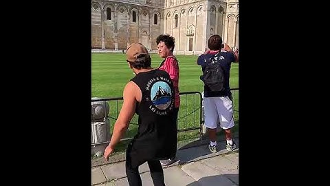 Giving High Fives At Leaning Tower of Pisa