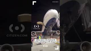 JetBlue plane tilts backwards while unloading at JFK Airport