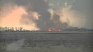 Wall Cloud to left of fire and another directly above fire 4 9 2011 Mapleton IA by lightskinedtan 147 views 13 years ago 38 seconds
