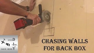 Chasing out a wall for an electrical back box and cable. Also how to get the cables behind coving