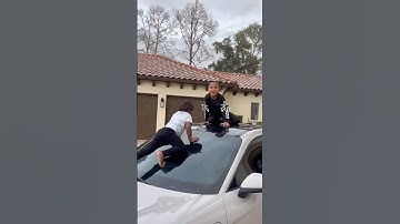 Dad catches daughter and little sister climbing on top moms new car #shorts