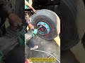 The process of tightening truck wheel bolts with a pneumatic impact wrench #shorts #tools #work