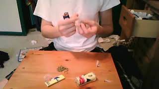 Tutorial on how to roll blunts in a hand roller