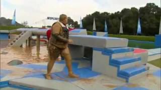 LMAO: Fat Gay Man With An Under Bite Busts His Azz During Obstacle Game Show!