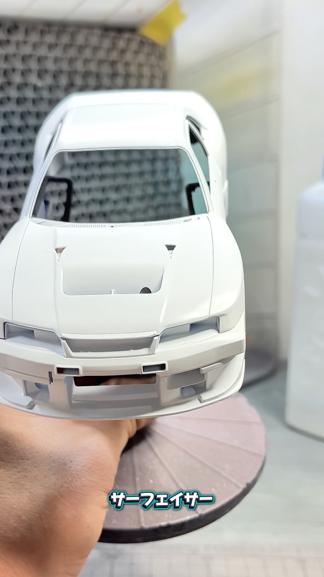 Applying primer makes hard-to-see scratches stand out, so let's