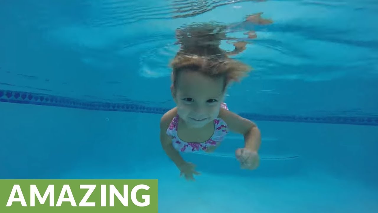 Twoyearold swims in pool all by herself YouTube