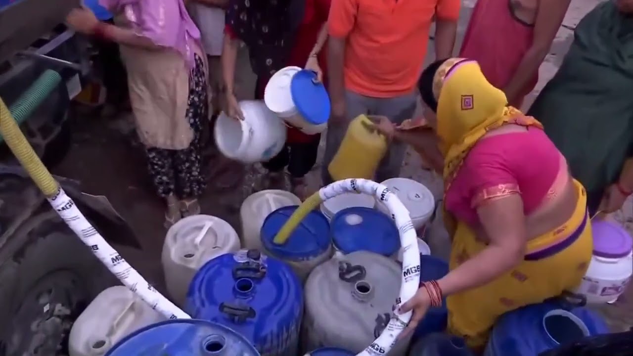 Delhi: Amid the water crisis in the national capital, water is being supplied to people through...