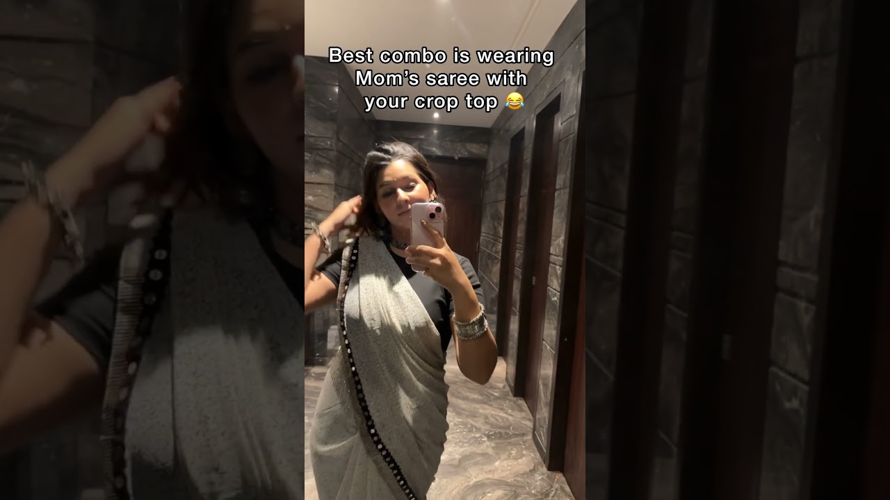 Best combo is wearing mom’s saree with your crop top 😂❤️