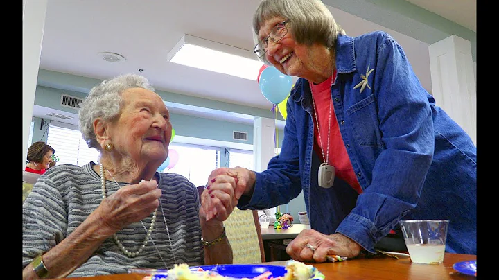 Woman turning 103 celebrates with cake, "Blue Moon...