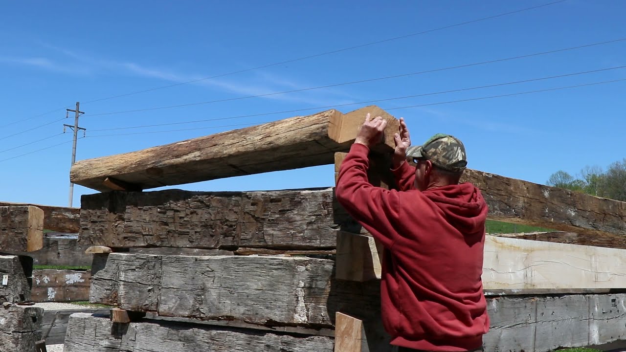 Cutting half dovetail notch on log cabin log YouTube