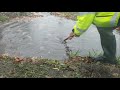 Draining Water On Street With Speeding Traffic