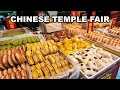 Amazing street food in chinese temple fair chinese street food in a morning market in rural china