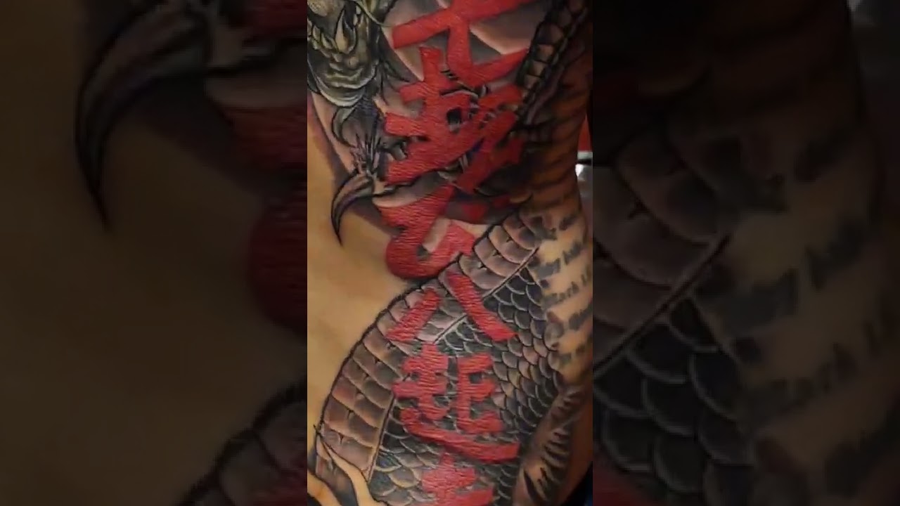 2 sessions Oriental dragon halfback tattoo.
