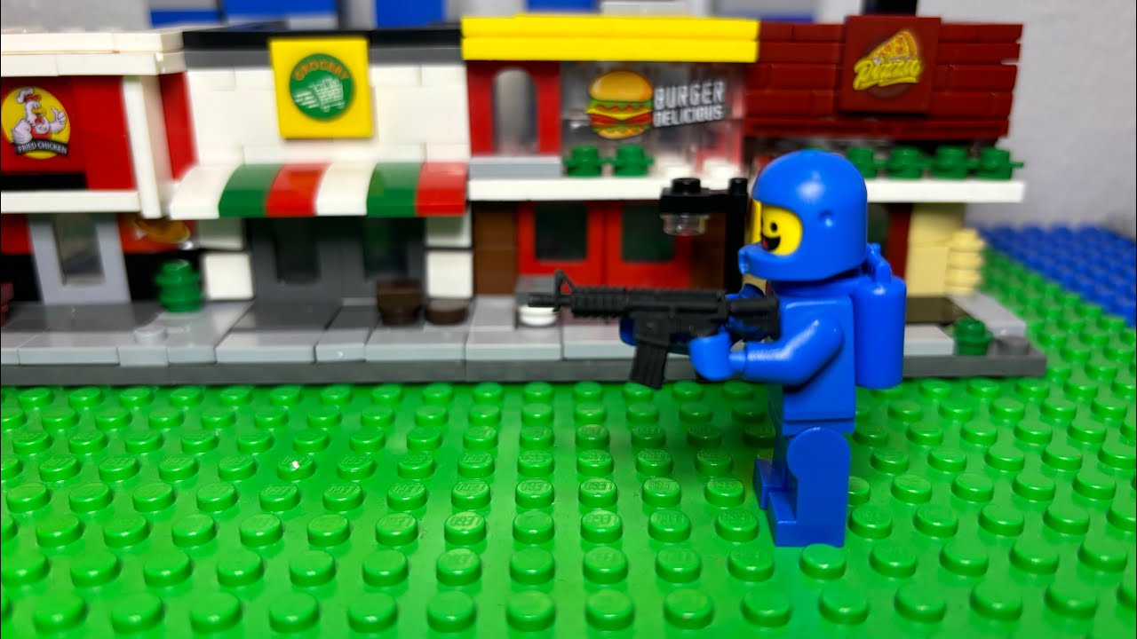 Blue space Lego man shoots a gun