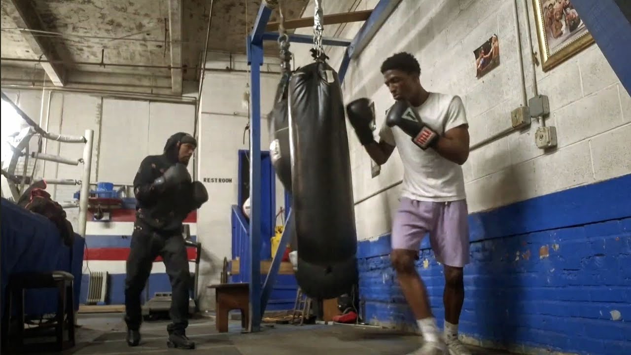 Me & my son Timontae hitting punching bags