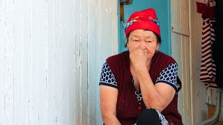 Life in a tiny Village of Kazakhstan. Old women live in Kazakhstan Village. Kazakhstan nowadays
