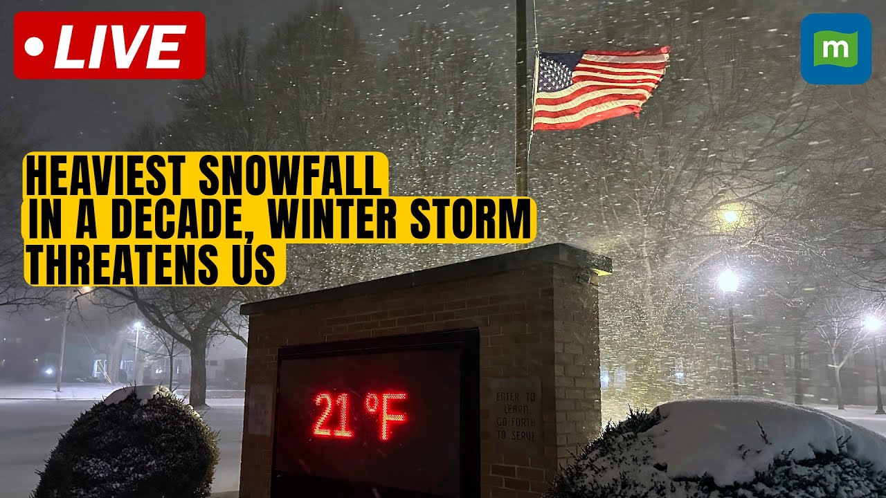Live: Snow blankets parts of US in cold snap as winter storm threatens ...