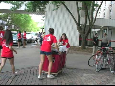 Creighton University welcomes the largest freshman class in history (1054) by moving them into the dorms.