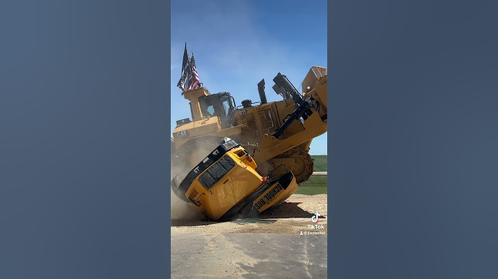 CAT D11 vs School bus. #heavyequipment #caterpillarequipment #jjscheckel #dozer #schoolbus
