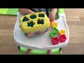 18-month-old playing with Baby's First Blocks by Fisher Price, Shape Sorting Toy