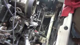 replacing a 89-98 geo tracker timing belt water pump thermostat and fan clutch pt 3