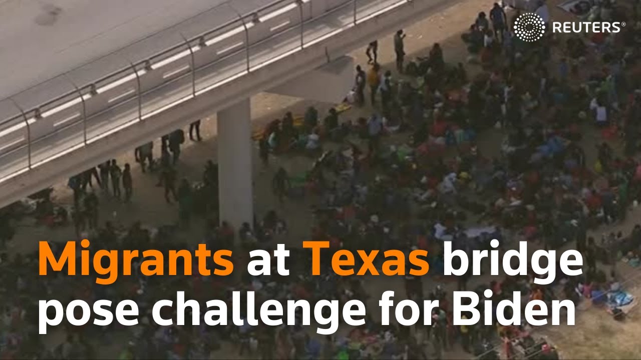 Migrants at Texas bridge pose challenge for Biden