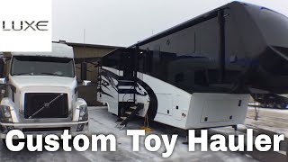 Luxe Toy Hauler Luxury Fifth Wheel  Pulling With Volvo  Smart Car On Top