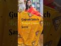 Classic zari-checked Bengal cotton saree enriched with Gujarati hand embroidery. #gujratistitch