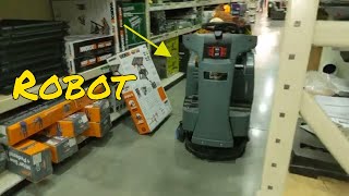 Nothing to see here! Just a robotic employee doing its job at a local Menards! The newest Roomba?