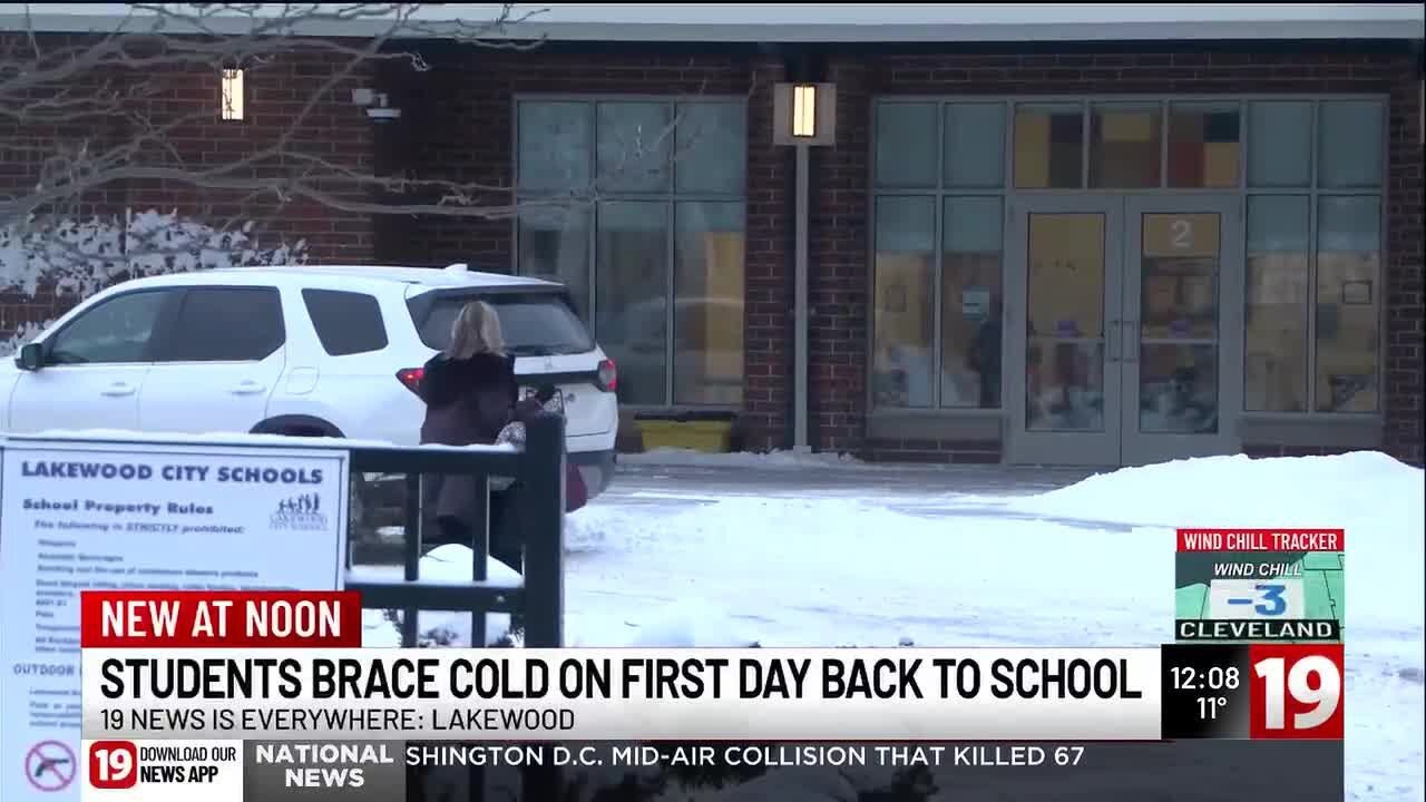 Lakewood students, parents brave cold to return to school