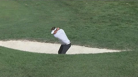 Jeff Overton holes 34-yard bunker shot for eagle a...