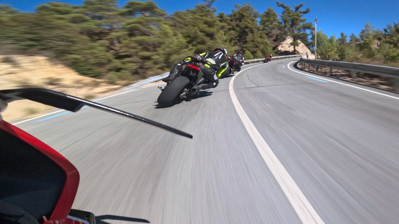 Superbikes racing through Blue Mountains.