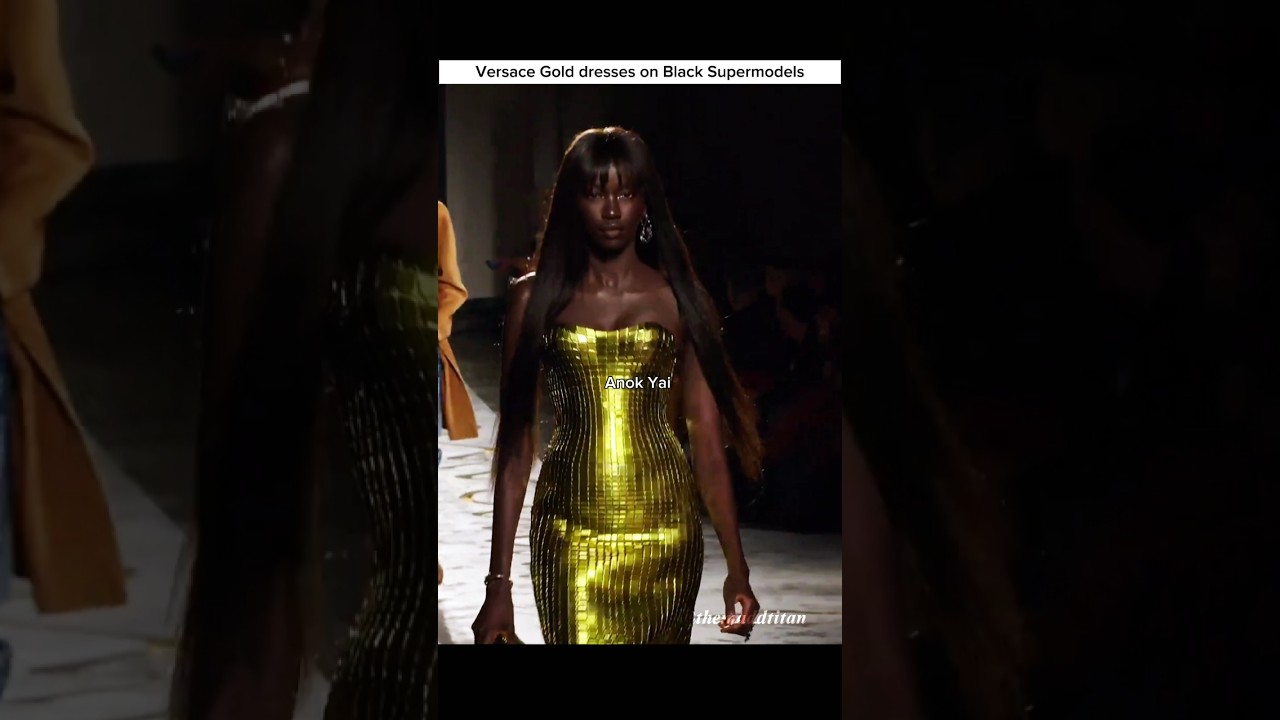 anok yai gold dress Velvet black dress with crystal and gold embroidery and a chiffon neck scarf main image 1