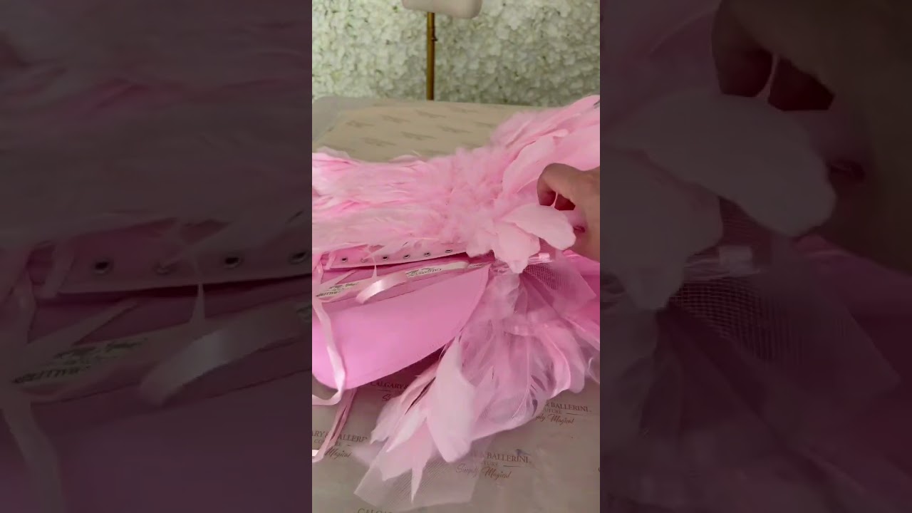 Making Pink feather corsets,  bridal tops & bustier dresses for your wedding day