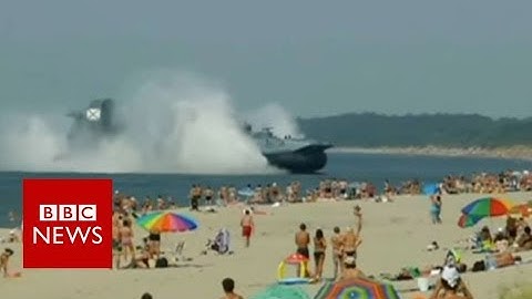 Russia: Military Hovercraft Shocks Sunbathers - BBC NEWS