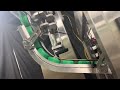 Capping machine with cap feeder by acasi machinery inc
