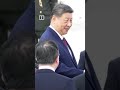 Trump greets Xi on airfield