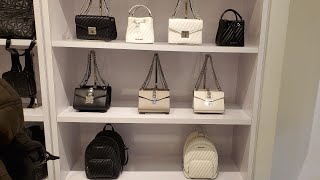 Michael Kors Purses, Shoes, Jackets, Coats, Hats, T shirts, Travel bags, Backpacks, flip flops